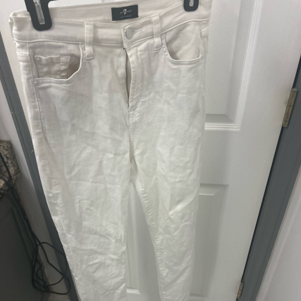 NWOT 7 FOR ALL MANKIND jeans with animal print silver pockets.